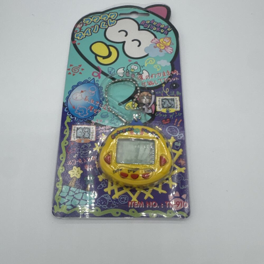 Original RakuRaku DinoKun YELLOW Dinkie Dino Electronic Virtual Pet TK-910 NEW